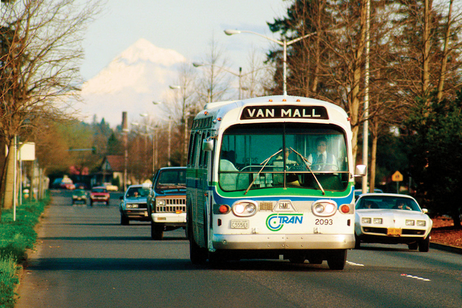 A C-TRAN bus makes its way down the road with Mt. Hood in the background during the system’s first few years in the 1980s.